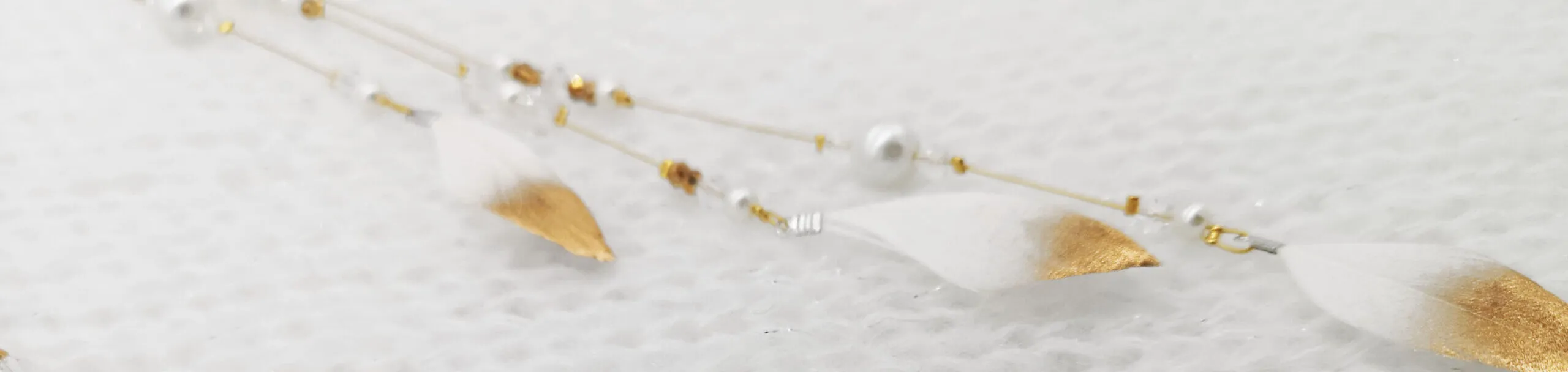 #feather charm